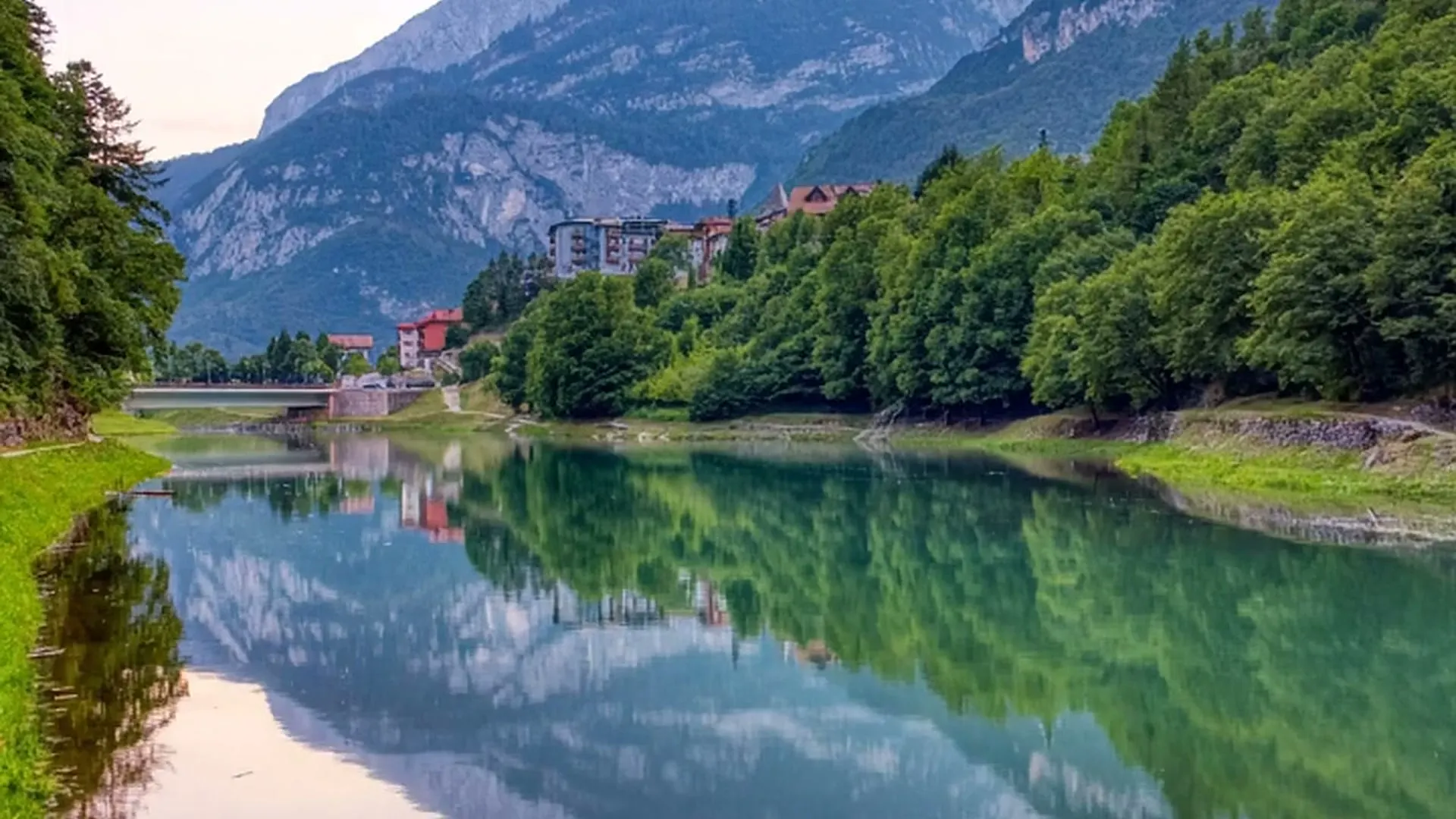 Lake Molveno in the evening, with the mountains reflected